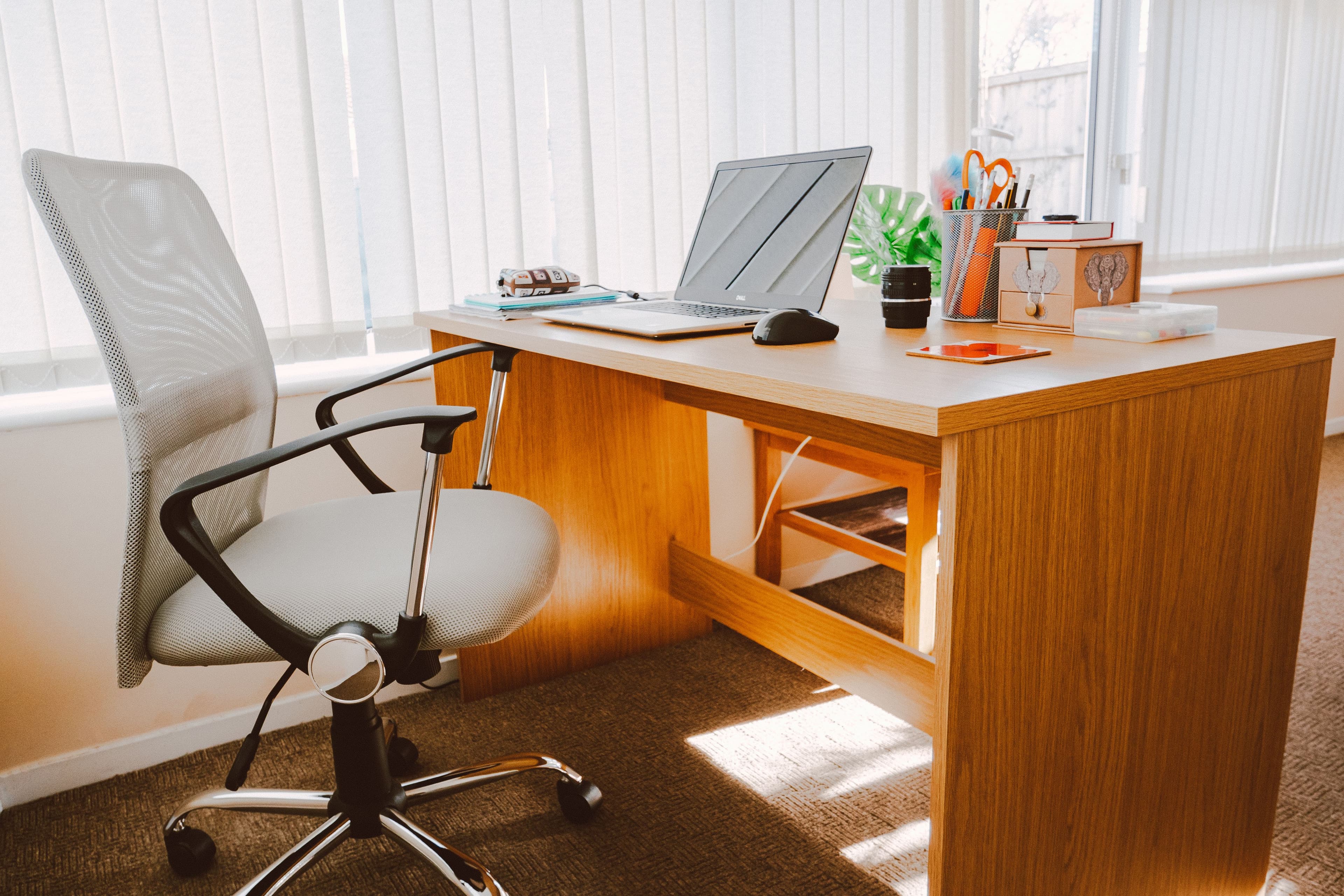 Ergonomic mesh office chair at a home office desk